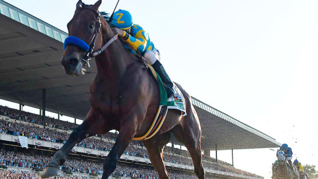 american pharoah belmont stakes triple crown.jpg